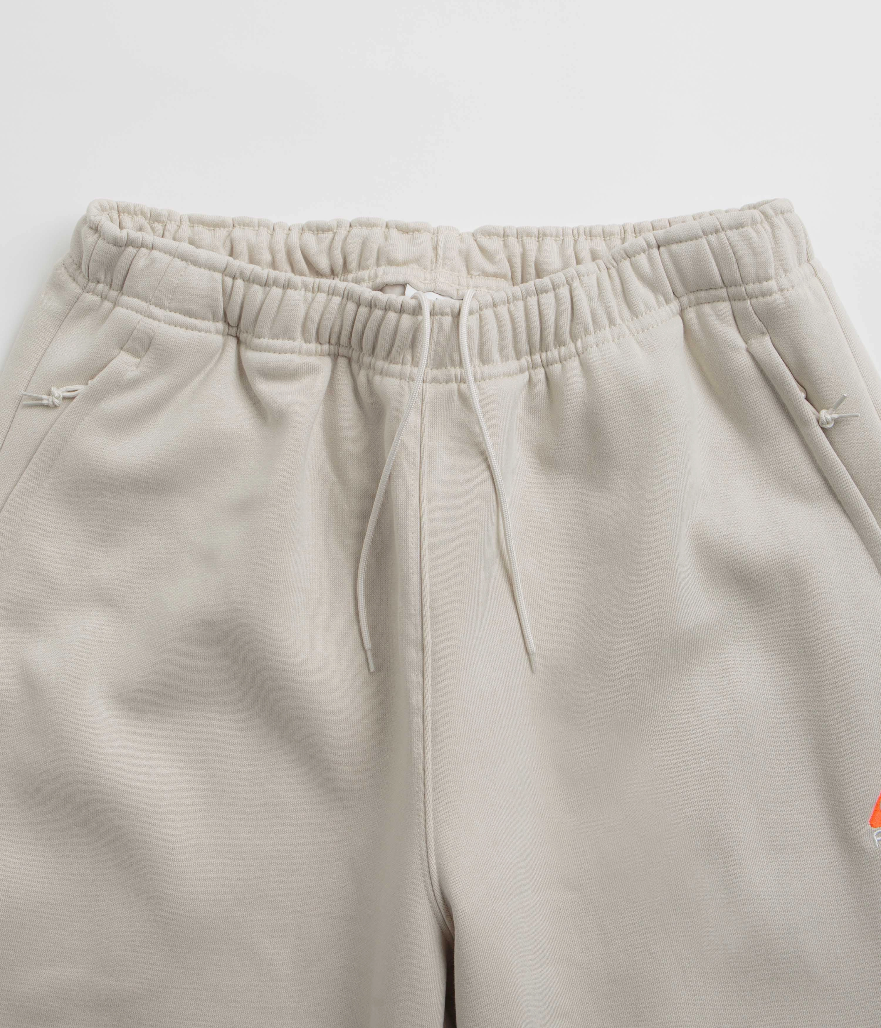 Nike ACG Tuff Fleece Lungs Pants - Light Orewood Brown / Hyper Crimson Weather resistant