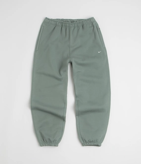 Essential Fit No Ride Up Nike Solo Swoosh Cuffed Sweatpants - Clay Green / Clay Green / White