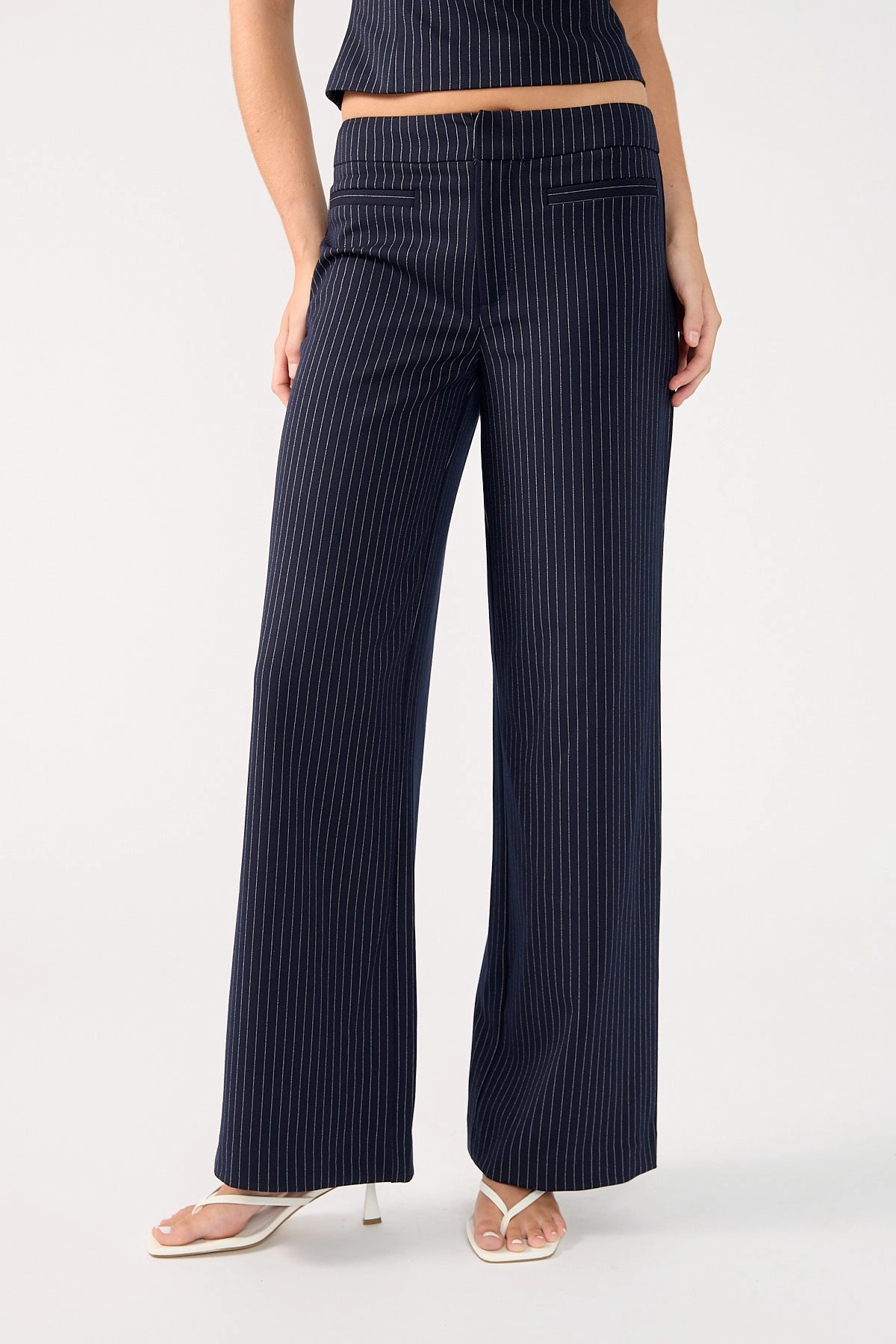 DoubleLayeredKnees RecyclablePackaging Perfect Stranger Odessa Pinstripe Mid Rise Tailored Pant Navy Pinstripe