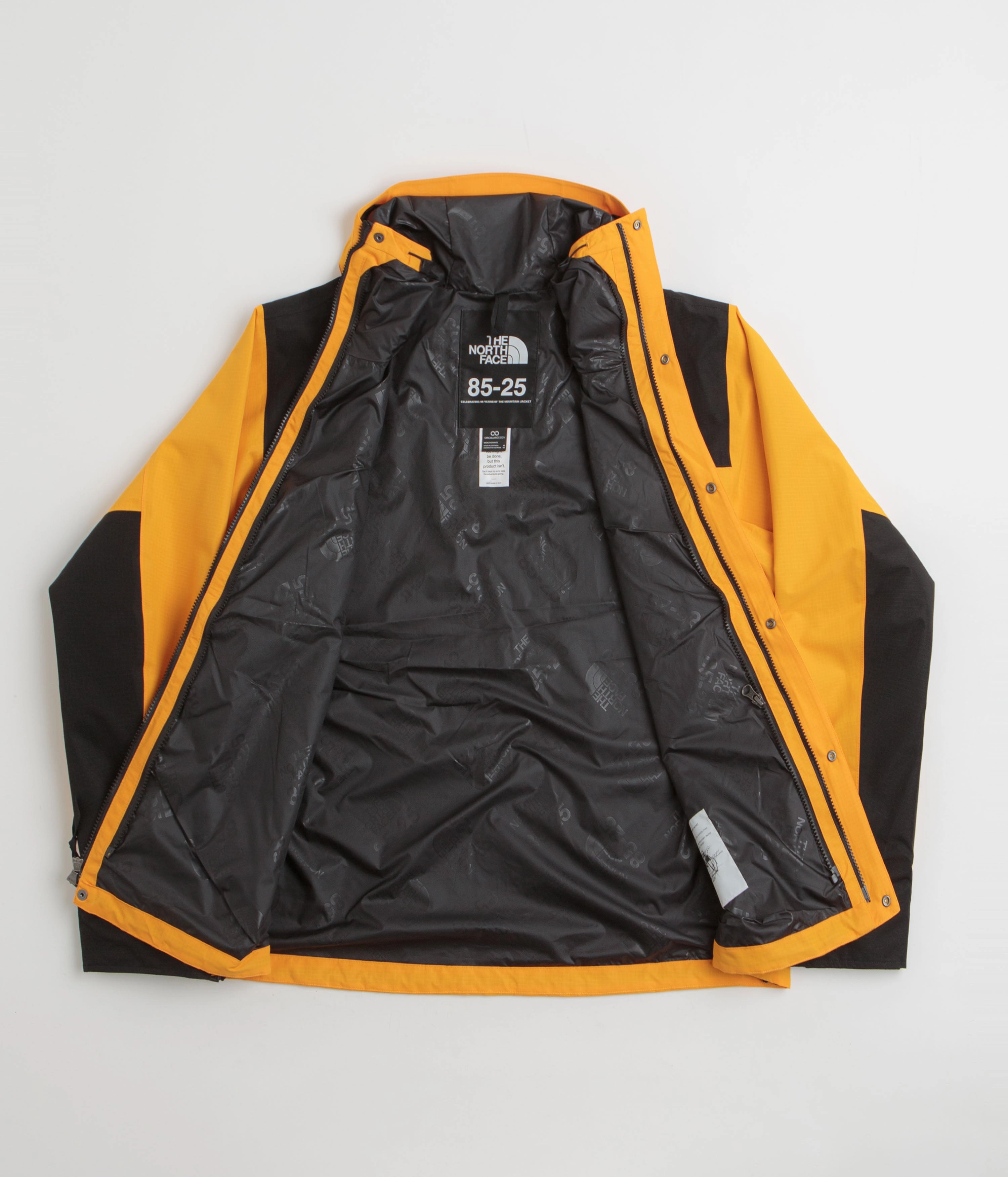 The North Face Dryvent Mono Mountain Jacket - Summit Gold / TNF Black Ergonomic Armhole Cut Layered Insulation