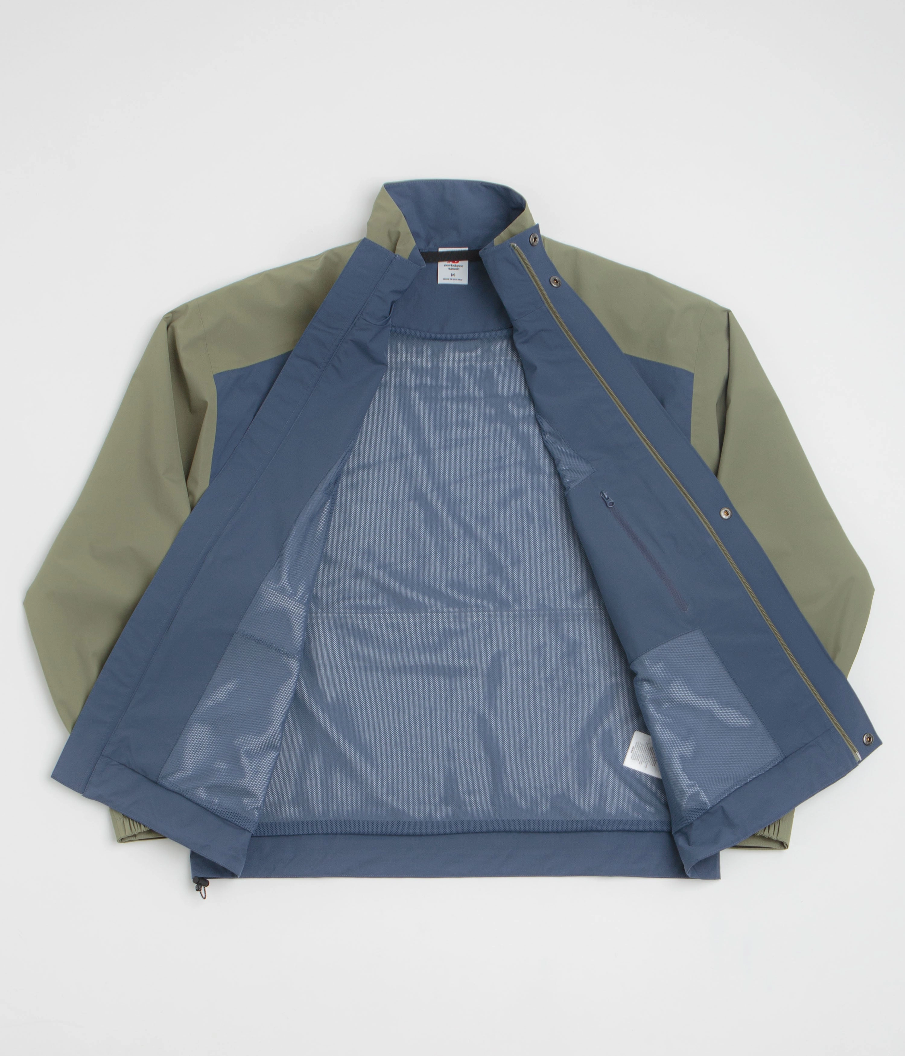 New Balance Numeric Waterproof Jacket - Khaki / Blue Adventure Day Look